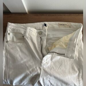 White wide leg pants with distressed bottom